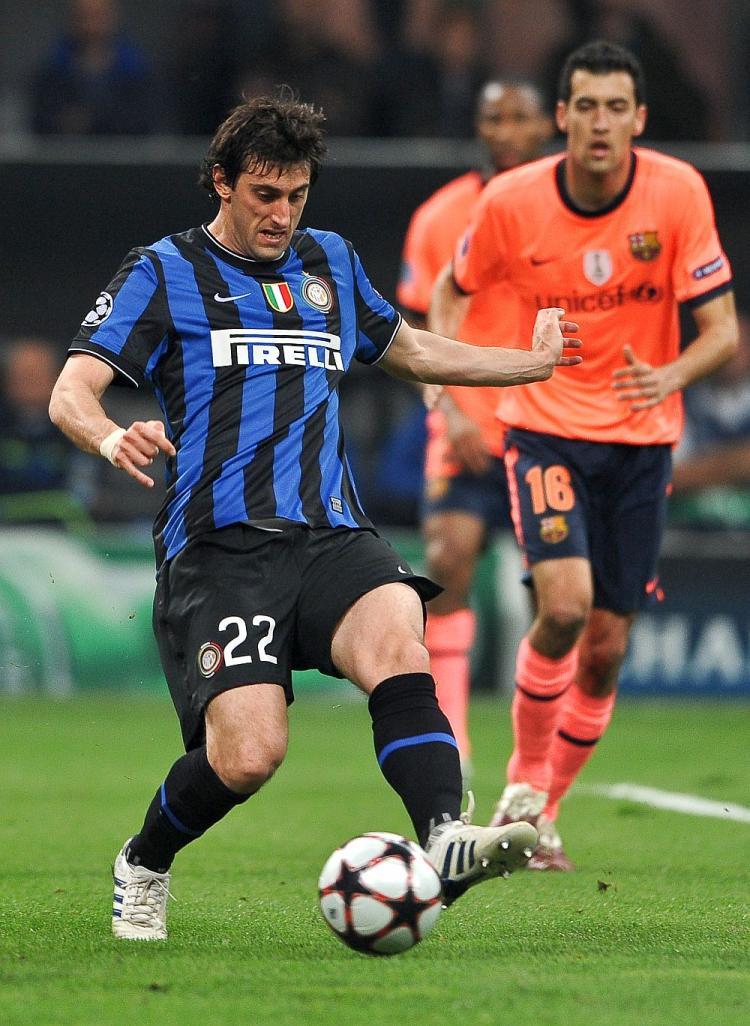 <a><img src="https://www.theepochtimes.com/assets/uploads/2015/09/Milito98578167.jpg" alt="Inter Milan's Argentine striker was instrumental in dismantling Barcelona on Tuesday. (Andreas Solaro/AFP/Getty Images)" title="Inter Milan's Argentine striker was instrumental in dismantling Barcelona on Tuesday. (Andreas Solaro/AFP/Getty Images)" width="320" class="size-medium wp-image-1820815"/></a>