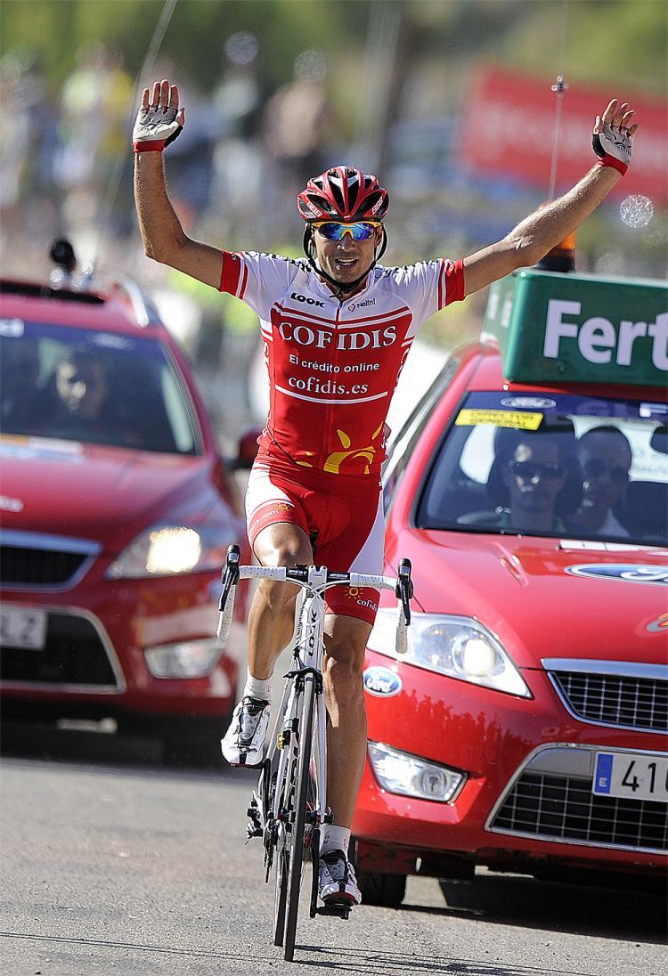 <a><img src="https://www.theepochtimes.com/assets/uploads/2015/09/Moncoutie103841299.jpg" alt="David Moncoutie of Cofidis celebrates as he crosses the finish line to win Stage Eight of the 75th Vuelta a Espana. (Jose Jordan/AFP/Getty Images)" title="David Moncoutie of Cofidis celebrates as he crosses the finish line to win Stage Eight of the 75th Vuelta a Espana. (Jose Jordan/AFP/Getty Images)" width="320" class="size-medium wp-image-1815120"/></a>