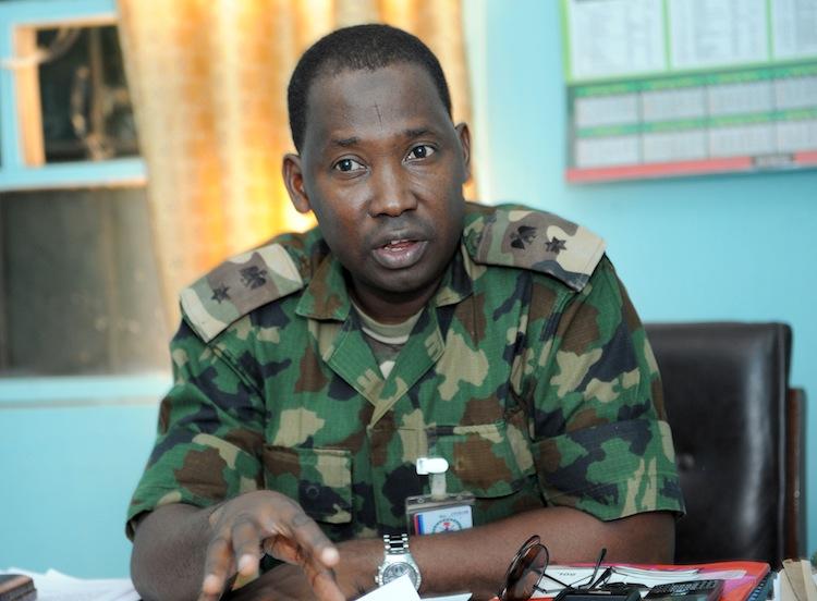 <a><img class="size-large wp-image-1786534" title="Spokesman of Joint Task Force in Maiduguri Lt.Col Sagir Musa speaks on the activities of the Islamist group Boko Haram in Maiduguri, northeastern Nigeria on May 10. (Pius Utomi Ekpei/AFP/GettyImages)" src="https://www.theepochtimes.com/assets/uploads/2015/09/Musa144933902.jpg" alt="" width="590" height="434"/></a>