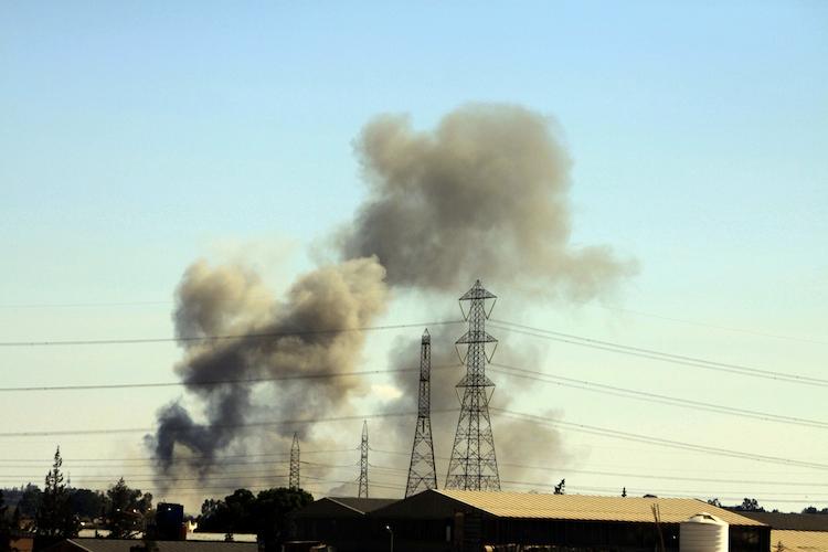 <a><img class="size-large wp-image-1787516" title="Smoke billows after an August 17, 2011 NATO air strike on Tripoli suburb Tajura, the site of a number of military installations. (Mahmud Turkia/AFP/Getty Images)" src="https://www.theepochtimes.com/assets/uploads/2015/09/NATO123828009.jpg" alt="" width="590" height="393"/></a>