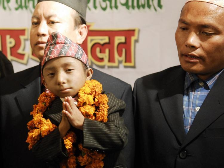<a><img src="https://www.theepochtimes.com/assets/uploads/2015/09/NEPAL.jpg" alt="Nepalese teenager Khagendra Thapa Magar (front) gestures to journalists during a press conference in Kathmandu on Feb. 21.  (Prakash Mathema/AFP/Getty Images)" title="Nepalese teenager Khagendra Thapa Magar (front) gestures to journalists during a press conference in Kathmandu on Feb. 21.  (Prakash Mathema/AFP/Getty Images)" width="320" class="size-medium wp-image-1822792"/></a>