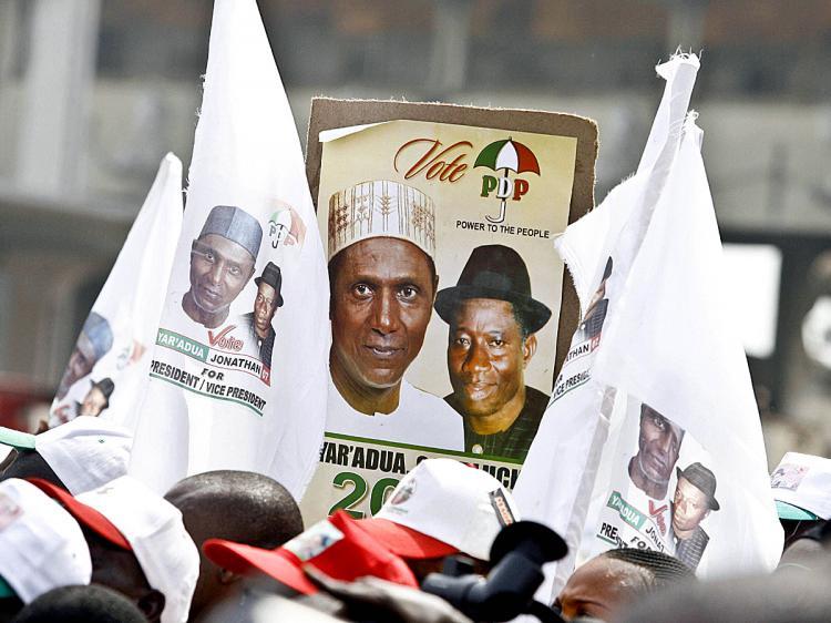 <a><img src="https://www.theepochtimes.com/assets/uploads/2015/09/NIGERIC.jpg" alt="Banners and posters showing Nigeria's President Umar Yar'Adua and Vice President Goodluck Jonathan during a 2007 election campaign. (Pius Utomi Ekpei/AFP/Getty Images)" title="Banners and posters showing Nigeria's President Umar Yar'Adua and Vice President Goodluck Jonathan during a 2007 election campaign. (Pius Utomi Ekpei/AFP/Getty Images)" width="320" class="size-medium wp-image-1823244"/></a>