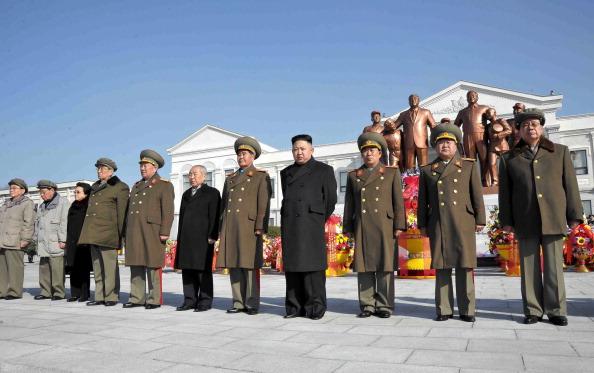 This photo released by North Korea's official Korean Central News Agency on Feb. 16 shows North Korean leader Kim Jong-Un (4th R) and senior senior officials from the party. (KNS/AFP/Getty Images)