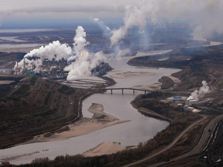 <a><img src="https://www.theepochtimes.com/assets/uploads/2015/09/OIL-SANDS-92370615.jpg" alt="Aerial view of the Suncor oil sands extraction facility on the banks of the Athabasca River and near the town of Fort McMurray in Alberta Province, Canada on October 23, 2009. American NGO, Corporate Ethics International (CEI), has launched a controversial ad campaign opposing the operation. (Mark Ralston/AFP/Getty Images)" title="Aerial view of the Suncor oil sands extraction facility on the banks of the Athabasca River and near the town of Fort McMurray in Alberta Province, Canada on October 23, 2009. American NGO, Corporate Ethics International (CEI), has launched a controversial ad campaign opposing the operation. (Mark Ralston/AFP/Getty Images)" width="320" class="size-medium wp-image-1816662"/></a>