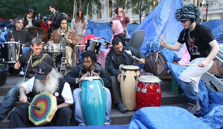 <a><img src="https://www.theepochtimes.com/assets/uploads/2015/09/OWS10.25StieberDrummers.jpg" alt="Drummers jam out at Zuccotti Park in the Financial District on Oct. 25. Attempts to curtail drumming to two or four hours a day have been unsuccessful so far, according to neighbors and protesters. (Zack Stieber/The Epoch Times)" title="Drummers jam out at Zuccotti Park in the Financial District on Oct. 25. Attempts to curtail drumming to two or four hours a day have been unsuccessful so far, according to neighbors and protesters. (Zack Stieber/The Epoch Times)" width="575" class="size-medium wp-image-1795759"/></a>