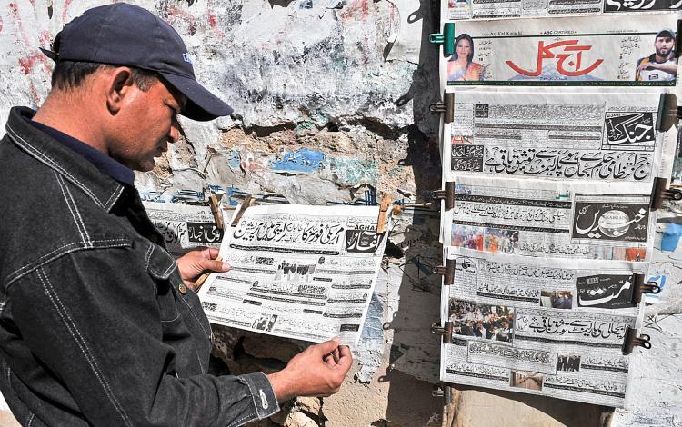 <a><img src="https://www.theepochtimes.com/assets/uploads/2015/09/PAKISTANC.jpg" alt="FACT OR FICTION: At a news stand in Karachi on Feb. 16, a Pakistani man reads an Urdu-language evening newspaper reporting the capture of a top Taliban commander. (Rizwan Tabassum/AFP/Getty Images)" title="FACT OR FICTION: At a news stand in Karachi on Feb. 16, a Pakistani man reads an Urdu-language evening newspaper reporting the capture of a top Taliban commander. (Rizwan Tabassum/AFP/Getty Images)" width="320" class="size-medium wp-image-1822983"/></a>