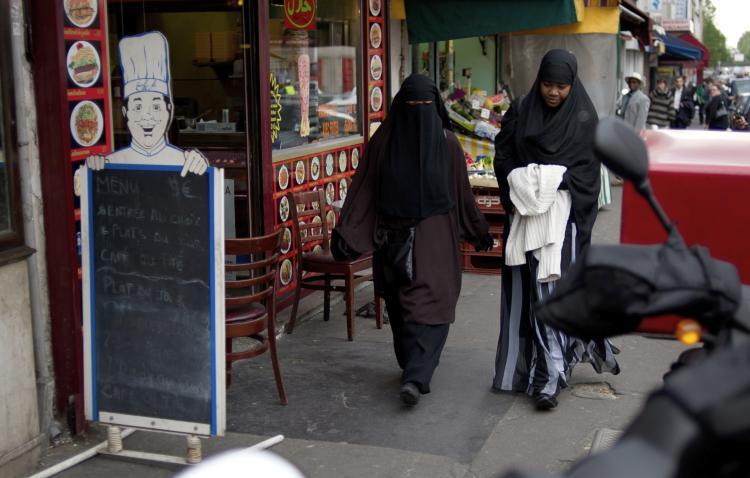 <a><img src="https://www.theepochtimes.com/assets/uploads/2015/09/PARIS-STREET-99881893.jpg" alt="Muslim women walk in the street outside Paris. Some French are worried about the 'Islamization' of their neighborhoods, as tensions between native French and Muslim immigrants rises. (Fred Dufour/Getty Images)" title="Muslim women walk in the street outside Paris. Some French are worried about the 'Islamization' of their neighborhoods, as tensions between native French and Muslim immigrants rises. (Fred Dufour/Getty Images)" width="320" class="size-medium wp-image-1818576"/></a>