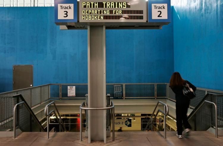 <a><img src="https://www.theepochtimes.com/assets/uploads/2015/09/PATH.jpg" alt="A commuter descends to the World Trade Center PATH train station platform to Hoboken May 14, 2007 in New York City. Bomb-detecting scanners will be set up in PATH stations between June 10, 2009 and July 10. (Chris Hondros/Getty Images)" title="A commuter descends to the World Trade Center PATH train station platform to Hoboken May 14, 2007 in New York City. Bomb-detecting scanners will be set up in PATH stations between June 10, 2009 and July 10. (Chris Hondros/Getty Images)" width="320" class="size-medium wp-image-1827961"/></a>