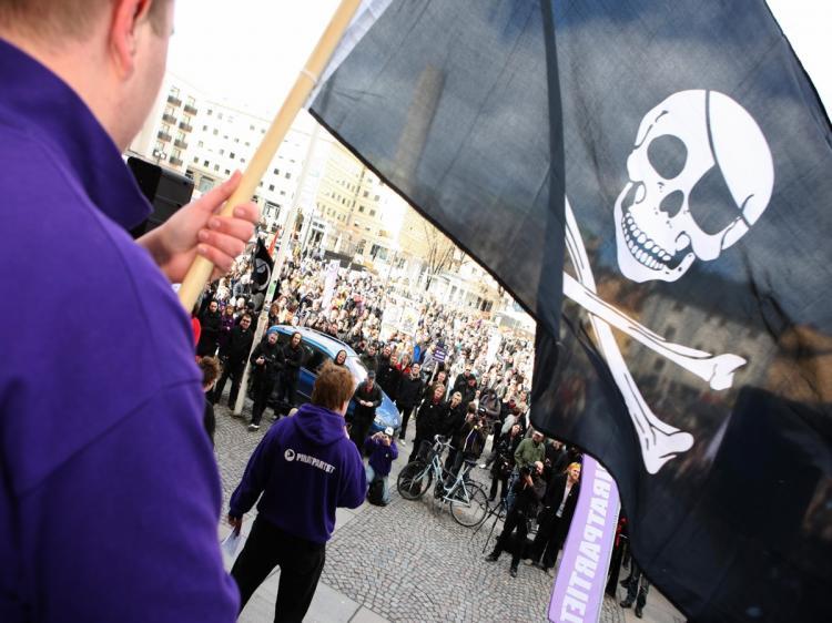 <a><img src="https://www.theepochtimes.com/assets/uploads/2015/09/PIRACY-89579397.jpg" alt="Supporters of the Pirate Bay Web site, one of the world's top illegal file-sharing Web sites, demonstrate in Stockholm on April 18, 2009. Sweden's tough new anti-piracy law has led to a sharp drop in illegal downloading.  (Fredrik Persson/AFP/Getty Images)" title="Supporters of the Pirate Bay Web site, one of the world's top illegal file-sharing Web sites, demonstrate in Stockholm on April 18, 2009. Sweden's tough new anti-piracy law has led to a sharp drop in illegal downloading.  (Fredrik Persson/AFP/Getty Images)" width="320" class="size-medium wp-image-1821943"/></a>
