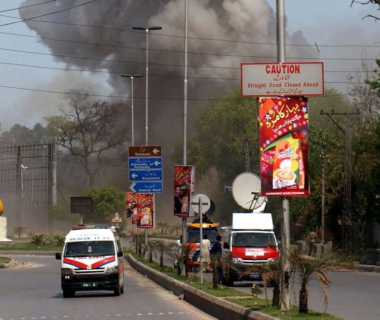 <a><img src="https://www.theepochtimes.com/assets/uploads/2015/09/Pakistan+April+05.jpg" alt="Smoke billows following a huge bomb blast outside the U.S. Consulate in Peshawar on April 5. Islamic militants armed with guns, grenades, and suicide car bombs targeted the U.S. Consulate and hit a political rally, killing 46 people.  (Hasham Ahmed/AFP/Getty Images )" title="Smoke billows following a huge bomb blast outside the U.S. Consulate in Peshawar on April 5. Islamic militants armed with guns, grenades, and suicide car bombs targeted the U.S. Consulate and hit a political rally, killing 46 people.  (Hasham Ahmed/AFP/Getty Images )" width="320" class="size-medium wp-image-1821420"/></a>