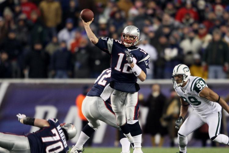 <a><img src="https://www.theepochtimes.com/assets/uploads/2015/09/PatsJets107364738crop.jpg" alt="TOO MUCH TOM: New England quarterback Tom Brady torched the New York Jets for 4 touchdown passes and 326 yards on Monday night. (Elsa/Getty Images)" title="TOO MUCH TOM: New England quarterback Tom Brady torched the New York Jets for 4 touchdown passes and 326 yards on Monday night. (Elsa/Getty Images)" width="320" class="size-medium wp-image-1811193"/></a>