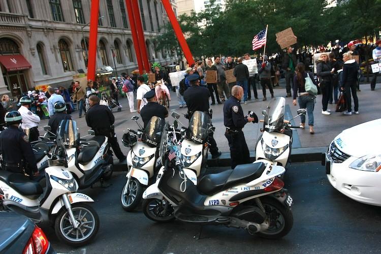 <a><img src="https://www.theepochtimes.com/assets/uploads/2015/09/Pentchoukov_20110918_Occuppoliceeet.JPG" alt="Heavy police presence in the Financial District prevented the Occupy Wall Street protest from achieving its goal. Protesters relocated to a nearby Zucotti Park. (Ivan Pentchoukov/The Epoch Times)" title="Heavy police presence in the Financial District prevented the Occupy Wall Street protest from achieving its goal. Protesters relocated to a nearby Zucotti Park. (Ivan Pentchoukov/The Epoch Times)" width="Default" class="size-medium wp-image-1797585"/></a>