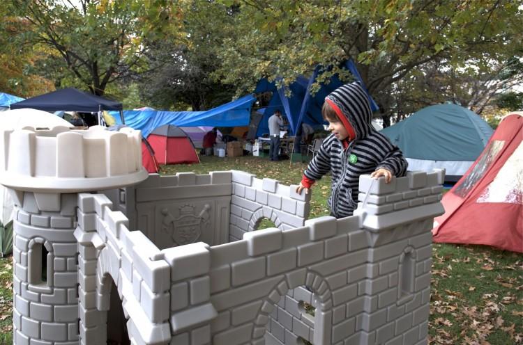 <a><img src="https://www.theepochtimes.com/assets/uploads/2015/09/Playing.jpg" alt="A young boy plays on a castle at the Occupy Ottawa camp in Confederation Park.  (Matthew Little/The Epoch Times)" title="A young boy plays on a castle at the Occupy Ottawa camp in Confederation Park.  (Matthew Little/The Epoch Times)" width="350" class="size-medium wp-image-1796074"/></a>