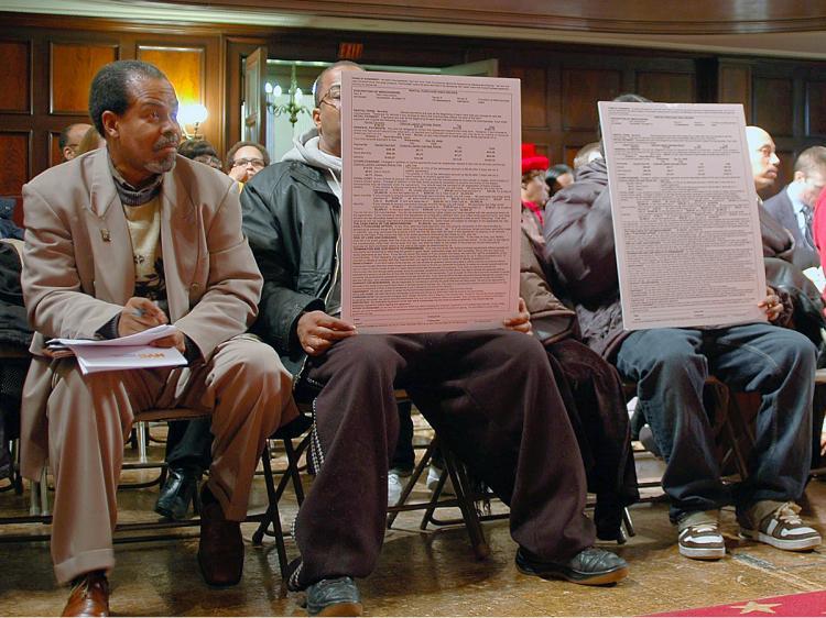 <a><img src="https://www.theepochtimes.com/assets/uploads/2015/09/RTO.jpg" alt="RENT-TO-OWN CONTRACTS: Concerned community members hold up enlarged rent-to-own store contracts at a council meeting Monday morning. City Council Committees on Consumer Affairs and Civil Rights heard testimony from concerned citizens and rent-to-own store (Jonathan Weeks/ The Epoch Times)" title="RENT-TO-OWN CONTRACTS: Concerned community members hold up enlarged rent-to-own store contracts at a council meeting Monday morning. City Council Committees on Consumer Affairs and Civil Rights heard testimony from concerned citizens and rent-to-own store (Jonathan Weeks/ The Epoch Times)" width="320" class="size-medium wp-image-1830979"/></a>