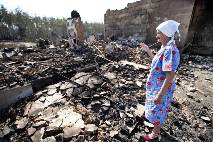 <a><img src="https://www.theepochtimes.com/assets/uploads/2015/09/RUSSIA-103197086-WEB.jpg" alt="DESTRUCTION: A Russian woman looks at the remains of her burnt out home in Voronezh, western Russia on Sunday. Large wildfires have killed at least 40 people causing estimated damages of $150 million.  (Alexey Sazonov/Getty Images)" title="DESTRUCTION: A Russian woman looks at the remains of her burnt out home in Voronezh, western Russia on Sunday. Large wildfires have killed at least 40 people causing estimated damages of $150 million.  (Alexey Sazonov/Getty Images)" width="320" class="size-medium wp-image-1816711"/></a>