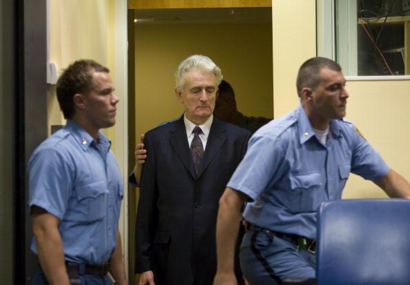 <a><img class="size-large wp-image-1775575" title="Former Bosnian Serb leader Radovan Karadzic (C) makes an initial appearance at the International Criminal Tribunal for the former Yugoslavia (ICTY) on July 31, 2008 in The Hague, The Netherlands. (Serge Ligtenberg/Getty Images)" src="https://www.theepochtimes.com/assets/uploads/2015/09/Radovan.jpg" alt="Former Bosnian Serb leader Radovan Karadzic (C) makes an initial appearance at the International Criminal Tribunal for the former Yugoslavia (ICTY) on July 31, 2008 in The Hague, The Netherlands. (Serge Ligtenberg/Getty Images)" width="590" height="410"/></a>