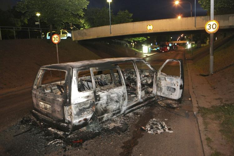 <a><img src="https://www.theepochtimes.com/assets/uploads/2015/09/STOCK101914854.jpg" alt="A burnt-out car after riots in the Stockholm suburb of Rinkeby on June 9. Up to 100 youths rioted for two straight nights in a heavily immigrant suburb of Stockholm, throwing bricks, setting fires and attacking the local police station. (Frederick Persson/Getty Images)" title="A burnt-out car after riots in the Stockholm suburb of Rinkeby on June 9. Up to 100 youths rioted for two straight nights in a heavily immigrant suburb of Stockholm, throwing bricks, setting fires and attacking the local police station. (Frederick Persson/Getty Images)" width="320" class="size-medium wp-image-1818831"/></a>