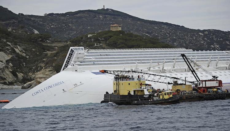 <a><img class="size-large wp-image-1792544" title="Cruiseship Costa Concordia and rock" src="https://www.theepochtimes.com/assets/uploads/2015/09/Ship-rocks2-137794613-WEB.jpg" alt="Cruiseship Costa Concordia and rock" width="590" height="336"/></a>