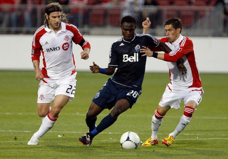 <a><img class="size-full wp-image-1787113" title="Vancouver Whitecaps v Toronto FC - Leg Two" src="https://www.theepochtimes.com/assets/uploads/2015/09/TFC-VWFC145139803.jpg" alt="Toronto FC's Torsten Frings (L) and Eric Avila (R) put some heat on Vancouver Whitecaps Gershon Koffie at BMO Field in Toronto Wednesday night. Toronto defeated Vancouver 1-0 to win the Voyageurs Cup for the fourth straight year and a place in CONCACAF Champions League. (Abelimages/Getty Images)" width="750" height="526"/></a>