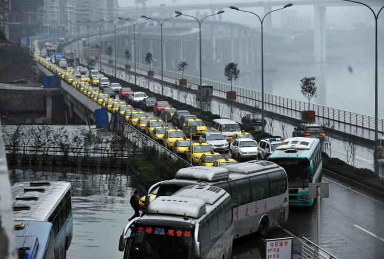 <a><img src="https://www.theepochtimes.com/assets/uploads/2015/09/Taxis_93248357.jpg" alt="Taxis queue up to get their fuel tanks filled in southwest China's Chongqing municipality on Nov. 18. Taxi drivers went on strike in early November to protest shortages of fuel and competition from unlicensed cabs, among other issues. The drivers on strike became some of the targets of Bo Xilai's 'hitting the black' campaign, said to be against gangsters. (STR/AFP/Getty Images)" title="Taxis queue up to get their fuel tanks filled in southwest China's Chongqing municipality on Nov. 18. Taxi drivers went on strike in early November to protest shortages of fuel and competition from unlicensed cabs, among other issues. The drivers on strike became some of the targets of Bo Xilai's 'hitting the black' campaign, said to be against gangsters. (STR/AFP/Getty Images)" width="320" class="size-medium wp-image-1824265"/></a>