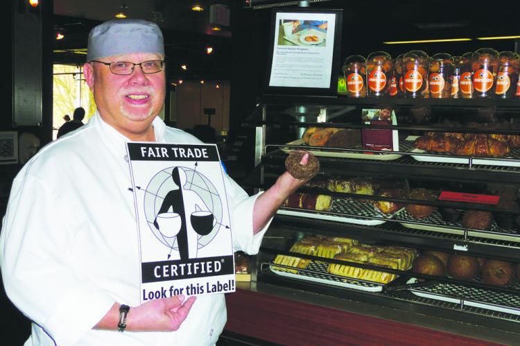 <a><img src="https://www.theepochtimes.com/assets/uploads/2015/09/UBCfairtradecampus_2011Vaniers.jpg" alt="Steve Golob, chef at UBC's Place Vanier, holds up a fair trade donut by Ethical Bean Coffee. UBC gained accreditation as Canada's first fair trade campus by meeting Fairtrade Canada's requirements for ethically sourced product availability, visibility, and promotion in the university. (Courtesy of UBC)" title="Steve Golob, chef at UBC's Place Vanier, holds up a fair trade donut by Ethical Bean Coffee. UBC gained accreditation as Canada's first fair trade campus by meeting Fairtrade Canada's requirements for ethically sourced product availability, visibility, and promotion in the university. (Courtesy of UBC)" width="320" class="size-medium wp-image-1804146"/></a>