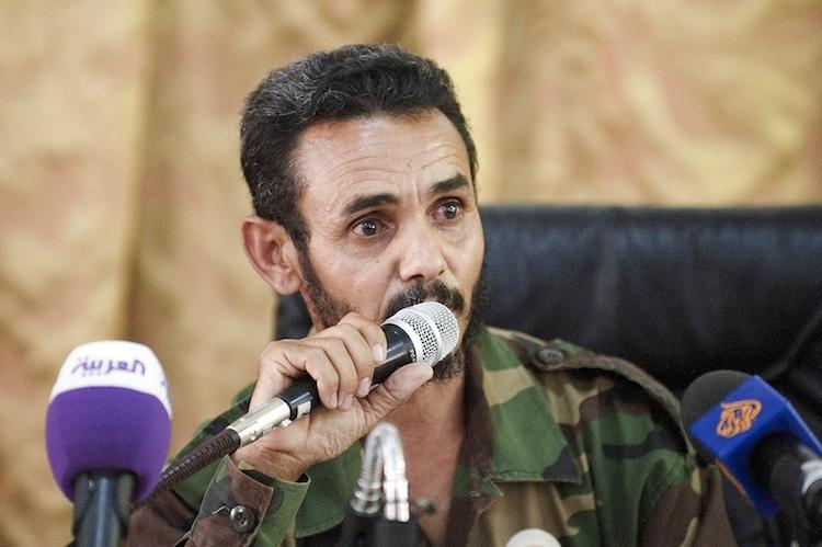 <a><img class="size-full wp-image-1786333" title="Ajami al-Ateri, commander of the Libyan brigade in charge of detaining Saif al-Islam, gives a press conference in Zintan on June 9. Libya has arrested a female Australian lawyer from the International Criminal Court for trying to pass 'dangerous' documents to Saif al-Islam, detained son of slain leader Moammar Gadhafi. (Gianluigi Guercia/AFP/GettyImages)" src="https://www.theepochtimes.com/assets/uploads/2015/09/Zintan146029457.jpg" alt="" width="750" height="499"/></a>