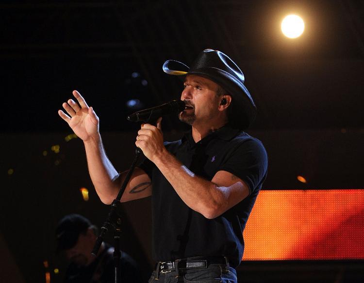 <a><img src="https://www.theepochtimes.com/assets/uploads/2015/09/acm_2010_98518207.jpg" alt="Musician Tim McGraw performs onstage during the 45th annual Academy of Country Music Awards rehearsals held at the MGM Grand Garden Arena on April 17, 2010 in Las Vegas, Nevada. (Kevin Winter/Getty Images)" title="Musician Tim McGraw performs onstage during the 45th annual Academy of Country Music Awards rehearsals held at the MGM Grand Garden Arena on April 17, 2010 in Las Vegas, Nevada. (Kevin Winter/Getty Images)" width="320" class="size-medium wp-image-1820879"/></a>