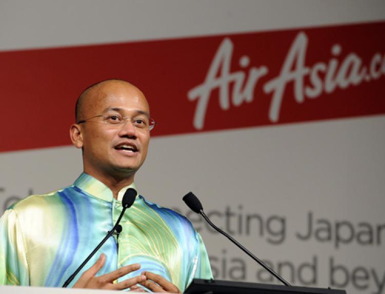 <a><img src="https://www.theepochtimes.com/assets/uploads/2015/09/airasia_104319527.jpg" alt="LOW COST CHALLENGE: Malaysia based low cost air carrier AirAsia X CEO Azran Osman Rani makes a pricing announcement during a press conference at a Tokyo hotel this past September. Rani is using creative ways to make his airline stand out from other low cost airlines. (Yoshikazu Tsuno/Getty Images)" title="LOW COST CHALLENGE: Malaysia based low cost air carrier AirAsia X CEO Azran Osman Rani makes a pricing announcement during a press conference at a Tokyo hotel this past September. Rani is using creative ways to make his airline stand out from other low cost airlines. (Yoshikazu Tsuno/Getty Images)" width="320" class="size-medium wp-image-1808927"/></a>