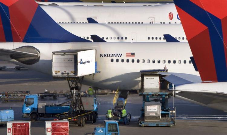 <a><img src="https://www.theepochtimes.com/assets/uploads/2015/09/airlines95340753.jpg" alt="Aircraft from Delta-Northwest are being supplied and loaded before departure at Schiphol Airport, near Amsterdam on December 26, 2009. The United States has asked airlines worldwide to tighten security after a Nigerian tried to blow up a U.S. airliner he boarded in Amsterdam, Dutch authorities said today. (Marcel Antonisse/AFP/Getty Images)" title="Aircraft from Delta-Northwest are being supplied and loaded before departure at Schiphol Airport, near Amsterdam on December 26, 2009. The United States has asked airlines worldwide to tighten security after a Nigerian tried to blow up a U.S. airliner he boarded in Amsterdam, Dutch authorities said today. (Marcel Antonisse/AFP/Getty Images)" width="320" class="size-medium wp-image-1824458"/></a>