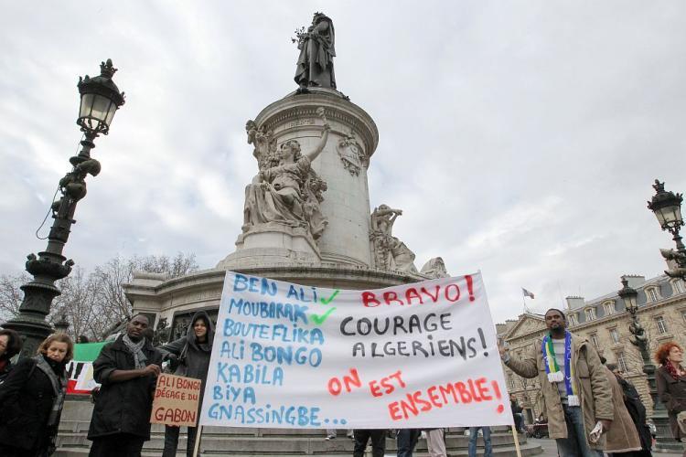 <a><img src="https://www.theepochtimes.com/assets/uploads/2015/09/algeria109025377.jpg" alt="People demonstrate, on February 12, 2011 at the republique square in Paris, to call for a regime change in Algeria. (Pierre Verdy/AFP/Getty Images)" title="People demonstrate, on February 12, 2011 at the republique square in Paris, to call for a regime change in Algeria. (Pierre Verdy/AFP/Getty Images)" width="320" class="size-medium wp-image-1808386"/></a>