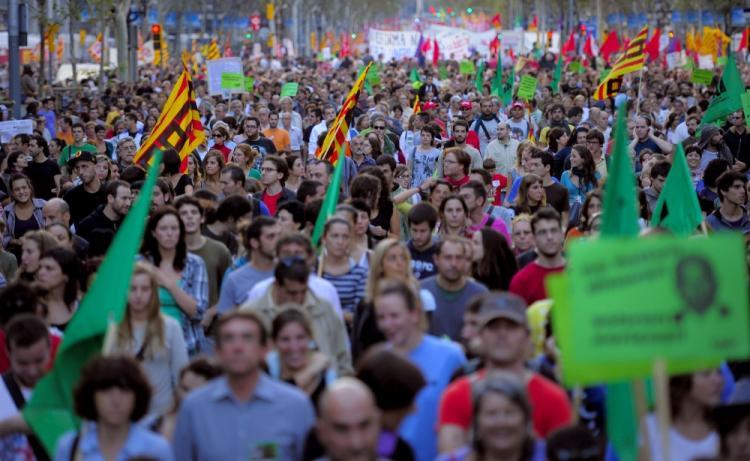<a><img src="https://www.theepochtimes.com/assets/uploads/2015/09/austerity_104538546.jpg" alt="Austerity Protests: Demonstrators walk with flags, placards and banners in central Barcelona during the general strike held in Spain on September 29, 2010. (Josep Lago/AFP/Getty Images)" title="Austerity Protests: Demonstrators walk with flags, placards and banners in central Barcelona during the general strike held in Spain on September 29, 2010. (Josep Lago/AFP/Getty Images)" width="320" class="size-medium wp-image-1814088"/></a>