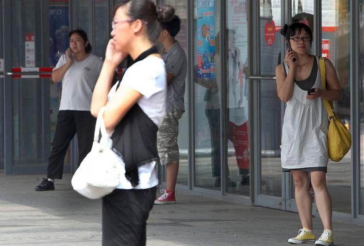 <a><img src="https://www.theepochtimes.com/assets/uploads/2015/09/beijing-phones103834996.jpg" alt="Chinese shoppers chat on their cellphones outside a mall in Beijing on September 1, 2010. Beijing will establish 'an information platform containing locations of Beijing citizens' based on the data obtained by tracking and monitoring China Mobile Limited's 17 million mobile phones in Beijing. (Franko Lee/AFP/Getty Images)" title="Chinese shoppers chat on their cellphones outside a mall in Beijing on September 1, 2010. Beijing will establish 'an information platform containing locations of Beijing citizens' based on the data obtained by tracking and monitoring China Mobile Limited's 17 million mobile phones in Beijing. (Franko Lee/AFP/Getty Images)" width="320" class="size-medium wp-image-1807295"/></a>