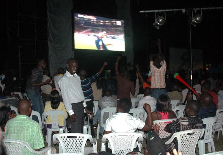 <a><img src="https://www.theepochtimes.com/assets/uploads/2015/09/bomb102822414.jpg" alt="A scene moments before twin bomb blasts tore through soccer fans watching the World Cup final at an Ethiopian-owned restaurant in the Kabalagala area of Kampala late on July 11. The bombing killed over 64 people, including an American, and wounding scores others. (Stringer/Getty Images)" title="A scene moments before twin bomb blasts tore through soccer fans watching the World Cup final at an Ethiopian-owned restaurant in the Kabalagala area of Kampala late on July 11. The bombing killed over 64 people, including an American, and wounding scores others. (Stringer/Getty Images)" width="320" class="size-medium wp-image-1817509"/></a>