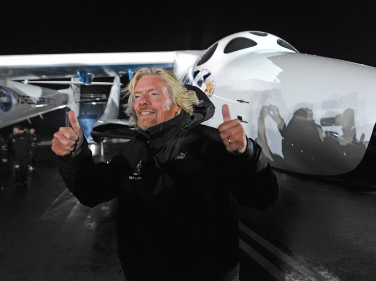 <a><img src="https://www.theepochtimes.com/assets/uploads/2015/09/branson-94136641.jpg" alt="Sir Richard Branson gives the thumbs up in front of Virgin Galactic's SpaceShipTwo, the world's first commercial spacecraft for tourists, as it is unveiled at it's world debut, at the Mojave Air and Space Port in Mojave, California on December 7, 2009. (Robyn Beck/AFP/Getty Images)" title="Sir Richard Branson gives the thumbs up in front of Virgin Galactic's SpaceShipTwo, the world's first commercial spacecraft for tourists, as it is unveiled at it's world debut, at the Mojave Air and Space Port in Mojave, California on December 7, 2009. (Robyn Beck/AFP/Getty Images)" width="320" class="size-medium wp-image-1821431"/></a>