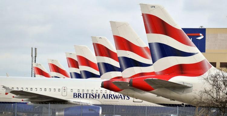 <a><img src="https://www.theepochtimes.com/assets/uploads/2015/09/british-airways-98097816.jpg" alt="In this file photo, British Airways planes are grounded at Heathrow Airport. The airline company is now in hot water for featuring alleged terrorist Osama bin Laden in an internal magazine. (Leon Neal/AFP/Getty Images)" title="In this file photo, British Airways planes are grounded at Heathrow Airport. The airline company is now in hot water for featuring alleged terrorist Osama bin Laden in an internal magazine. (Leon Neal/AFP/Getty Images)" width="320" class="size-medium wp-image-1819071"/></a>