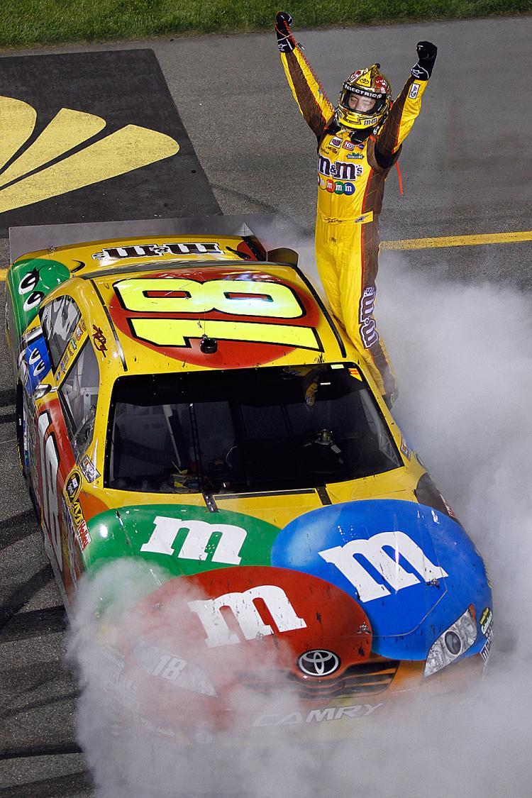 <a><img src="https://www.theepochtimes.com/assets/uploads/2015/09/busch98788560.jpg" alt="Kyle Busch, driver of the #18 M&M's Toyota, celebrates with after winning the NASCAR Sprint Cup Series Crown Royal Presents the Heath Calhoun 400 at Richmond International Raceway. (Jason Smith/Getty Images for NASCAR)" title="Kyle Busch, driver of the #18 M&M's Toyota, celebrates with after winning the NASCAR Sprint Cup Series Crown Royal Presents the Heath Calhoun 400 at Richmond International Raceway. (Jason Smith/Getty Images for NASCAR)" width="320" class="size-medium wp-image-1820428"/></a>