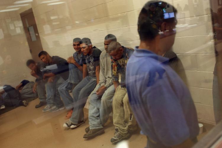 <a><img src="https://www.theepochtimes.com/assets/uploads/2015/09/busted.JPG" alt="BUSTED: Illegal immigrants sit in a holding cell at a U.S. Border Patrol station after they were caught crossing from Mexico into the United States on Aug. 7 near Laredo, Texas.  (John Moore/Getty Images)" title="BUSTED: Illegal immigrants sit in a holding cell at a U.S. Border Patrol station after they were caught crossing from Mexico into the United States on Aug. 7 near Laredo, Texas.  (John Moore/Getty Images)" width="320" class="size-medium wp-image-1833546"/></a>
