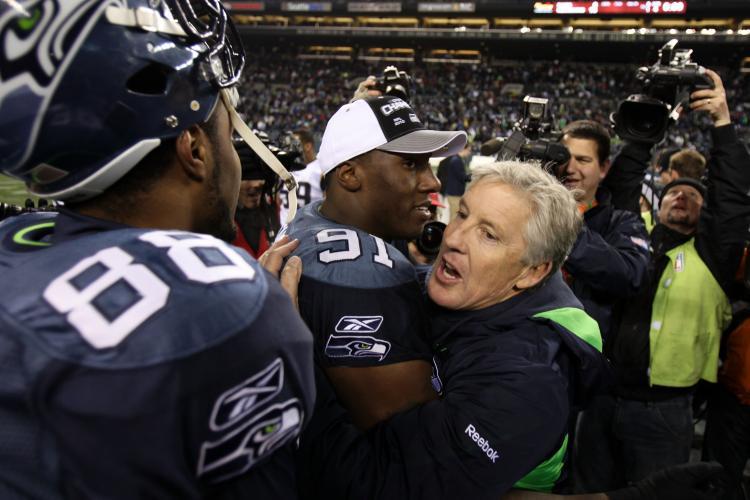 <a><img src="https://www.theepochtimes.com/assets/uploads/2015/09/carroll.jpg" alt="A FIRST TIME: Led by head coach Pete Carroll (right), the Seattle Seahawks become the first team to head into the postseason with a losing record. (Otto Greule Jr/Getty Images)" title="A FIRST TIME: Led by head coach Pete Carroll (right), the Seattle Seahawks become the first team to head into the postseason with a losing record. (Otto Greule Jr/Getty Images)" width="320" class="size-medium wp-image-1810162"/></a>