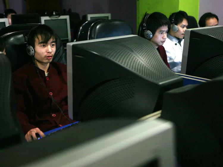 <a><img src="https://www.theepochtimes.com/assets/uploads/2015/09/chafe79146135.jpg" alt="Chinese youths surf the Web in an Internet cafe in Chongqing Municipality, China. (China Photos/Getty Images)" title="Chinese youths surf the Web in an Internet cafe in Chongqing Municipality, China. (China Photos/Getty Images)" width="320" class="size-medium wp-image-1827245"/></a>