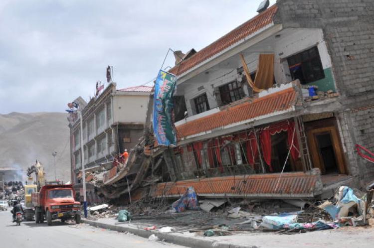 <a><img src="https://www.theepochtimes.com/assets/uploads/2015/09/china_earthquake_98474069.jpg" alt="The rubble of a collapsed building, following the 6.9-magnitude earthquake hitting Yushu county. April 15 photo. (STR/AFP/Getty Images)" title="The rubble of a collapsed building, following the 6.9-magnitude earthquake hitting Yushu county. April 15 photo. (STR/AFP/Getty Images)" width="320" class="size-medium wp-image-1821050"/></a>