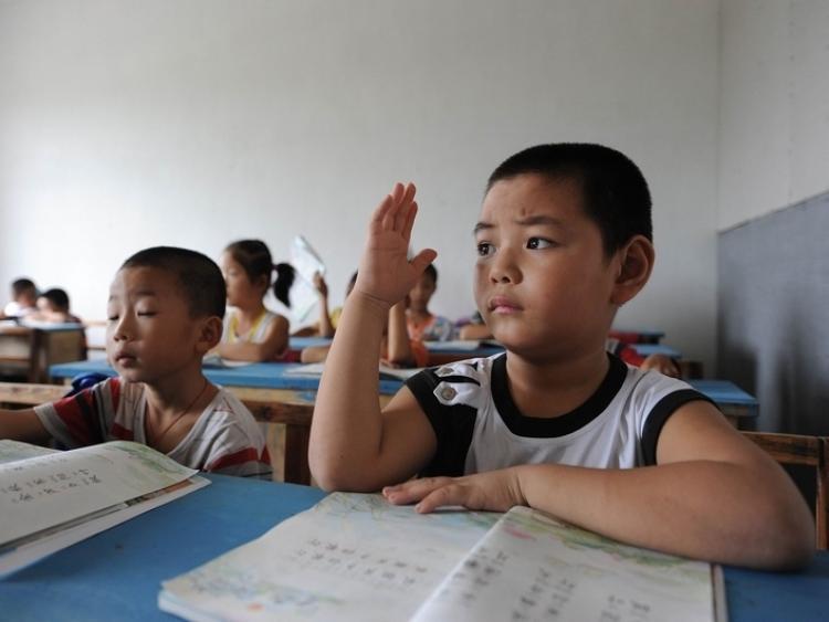 <a><img src="https://www.theepochtimes.com/assets/uploads/2015/09/china_elementary_school_teachers.jpg" alt="A language class in a Chinese elementary school.  (Getty Images)" title="A language class in a Chinese elementary school.  (Getty Images)" width="320" class="size-medium wp-image-1813031"/></a>