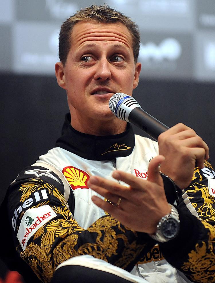 <a><img src="https://www.theepochtimes.com/assets/uploads/2015/09/choo92625199.jpg" alt="Seven-time World Driving Champion Michael Schumacher will for drive the new Mercedes Formula One team in 2010. (Frederic J. Brown)" title="Seven-time World Driving Champion Michael Schumacher will for drive the new Mercedes Formula One team in 2010. (Frederic J. Brown)" width="320" class="size-medium wp-image-1824521"/></a>