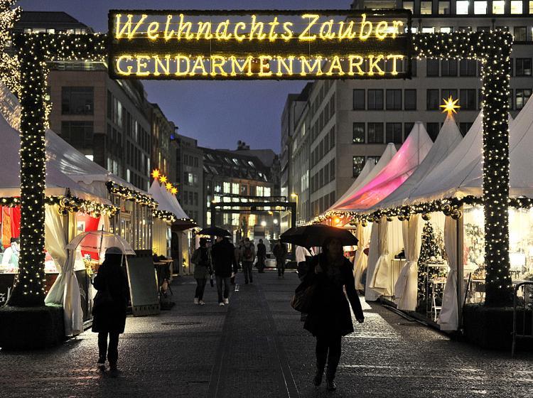 <a><img src="https://www.theepochtimes.com/assets/uploads/2015/09/chopp107071183.jpg" alt="GERMANS SPENDING AGAIN: A few shoppers brave the rain to attend the opening day of the Christmas market at Gendarmenmarkt in Berlin, Nov. 22, as the Christmas shopping season starts. German consumer spending growth hit a 5-year-high last month and retailers are very optimistic about the holiday season. (Odd Andersen/AFP/Getty Images)" title="GERMANS SPENDING AGAIN: A few shoppers brave the rain to attend the opening day of the Christmas market at Gendarmenmarkt in Berlin, Nov. 22, as the Christmas shopping season starts. German consumer spending growth hit a 5-year-high last month and retailers are very optimistic about the holiday season. (Odd Andersen/AFP/Getty Images)" width="320" class="size-medium wp-image-1811774"/></a>