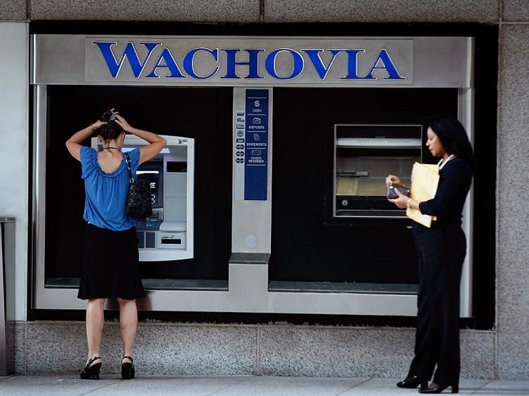 <a><img src="https://www.theepochtimes.com/assets/uploads/2015/09/cigarette83050650.jpg" alt="People use an ATM at a Wachovia bank branch September 29, 2008 in Miami, Florida.   (Joe Raedle/Getty Images)" title="People use an ATM at a Wachovia bank branch September 29, 2008 in Miami, Florida.   (Joe Raedle/Getty Images)" width="320" class="size-medium wp-image-1833584"/></a>