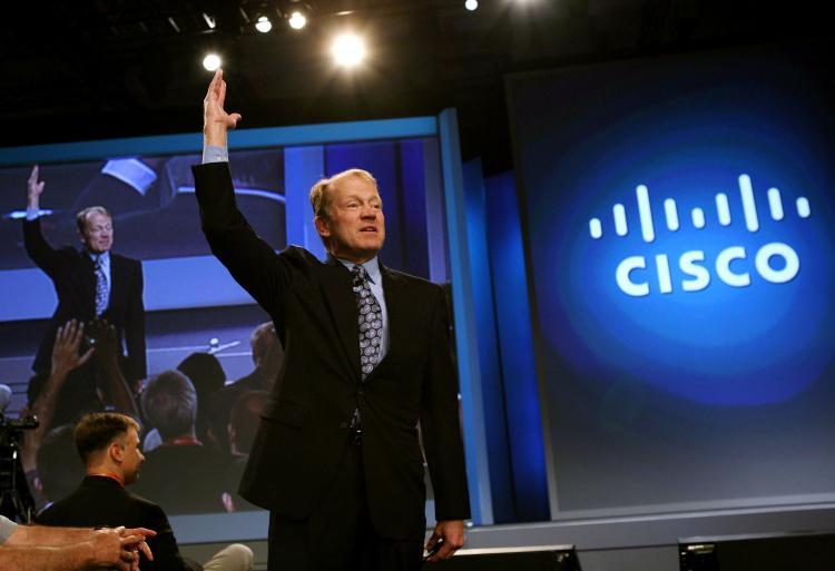 <a><img src="https://www.theepochtimes.com/assets/uploads/2015/09/cisco_86167792.jpg" alt="In this file photo, Cisco Chairman and CEO John delivers a keynote address during the RSA Conference in San Francisco, California. Cisco Systems announced that it was buying Starent Networks, which makes multimedia infrastructure for mobile operators. (Justin Sullivan/Getty Images)" title="In this file photo, Cisco Chairman and CEO John delivers a keynote address during the RSA Conference in San Francisco, California. Cisco Systems announced that it was buying Starent Networks, which makes multimedia infrastructure for mobile operators. (Justin Sullivan/Getty Images)" width="320" class="size-medium wp-image-1825781"/></a>