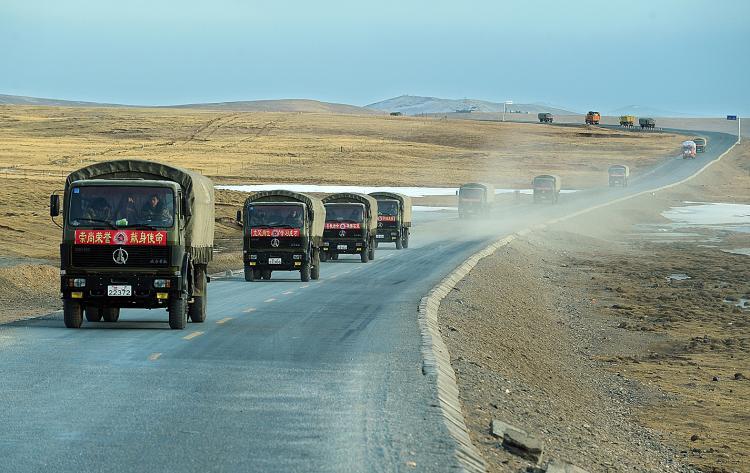 <a><img src="https://www.theepochtimes.com/assets/uploads/2015/09/cluck98534494.jpg" alt="A convoy of military trucks bringing quake relief goods travels along the Qinghai-Tibet plateau on April 19, 2010 headed the Jiegu quake zone that was hit by a 6.9 magnitude earthquake on April 14. (Frederic J. Brown/AFP/Getty Images)" title="A convoy of military trucks bringing quake relief goods travels along the Qinghai-Tibet plateau on April 19, 2010 headed the Jiegu quake zone that was hit by a 6.9 magnitude earthquake on April 14. (Frederic J. Brown/AFP/Getty Images)" width="320" class="size-medium wp-image-1818437"/></a>
