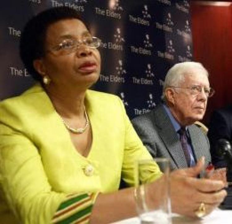 <a><img src="https://www.theepochtimes.com/assets/uploads/2015/09/cm01.jpg" alt="Graca Machel, the wife of Nelson Mandela, talks during a joint press conference with former United States President Jimmy Carter (C) in Johannesburg on November 24, 2008. (Alexander Joe/AFP/Getty Images)" title="Graca Machel, the wife of Nelson Mandela, talks during a joint press conference with former United States President Jimmy Carter (C) in Johannesburg on November 24, 2008. (Alexander Joe/AFP/Getty Images)" width="320" class="size-medium wp-image-1832802"/></a>
