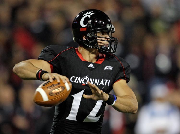 <a><img src="https://www.theepochtimes.com/assets/uploads/2015/09/collaros93901318.jpg" alt="GAME TO REMEMBER: Cincinnati quarterback Zach Collaros guided the Bearcats offense to seven touchdowns on Saturday against Rutgers. (Andy Lyons/Getty Images)" title="GAME TO REMEMBER: Cincinnati quarterback Zach Collaros guided the Bearcats offense to seven touchdowns on Saturday against Rutgers. (Andy Lyons/Getty Images)" width="320" class="size-medium wp-image-1811880"/></a>