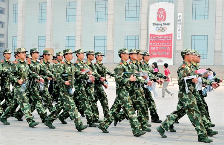 <a><img src="https://www.theepochtimes.com/assets/uploads/2015/09/crackdown80904416.jpg" alt="Chinese paramilitary policemen patrol past the Beijing Olympics countdown clock on the edge of Tiananmen Square in Beijing on April 29, 2008. Leading up to the Olympics the Chinese regime cracked down on groups deemed dissidents. (Teh Eng Koon/AFP/GETTY IMAGES)" title="Chinese paramilitary policemen patrol past the Beijing Olympics countdown clock on the edge of Tiananmen Square in Beijing on April 29, 2008. Leading up to the Olympics the Chinese regime cracked down on groups deemed dissidents. (Teh Eng Koon/AFP/GETTY IMAGES)" width="320" class="size-medium wp-image-1831305"/></a>