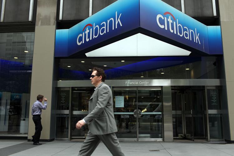 <a><img src="https://www.theepochtimes.com/assets/uploads/2015/09/credit_cards_98545778.jpg" alt="NEW YORK - APRIL 19: People walk by a Citibank office in midtown Manhattan on April 19, 2010 in New York City. (Spencer Platt/Getty Images)" title="NEW YORK - APRIL 19: People walk by a Citibank office in midtown Manhattan on April 19, 2010 in New York City. (Spencer Platt/Getty Images)" width="320" class="size-medium wp-image-1801874"/></a>